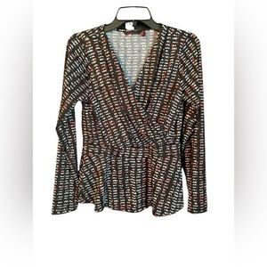 Sofia Vergara patterned peplum blouse. Flattering v shape. Long sleeve. Medium.